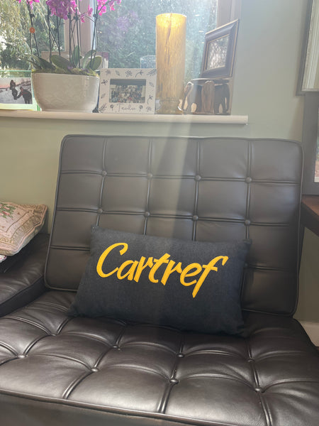 Cartref - Grey Wool cushion with text in Mustard
