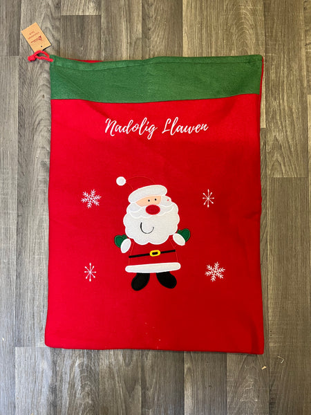Red and Green Santa Christmas Sack with 'Nadolig Llawen'