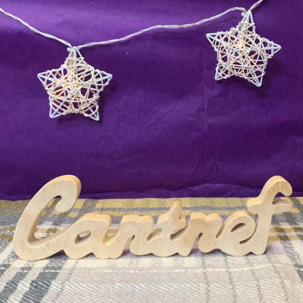 Cartref - Gair mewn Pren