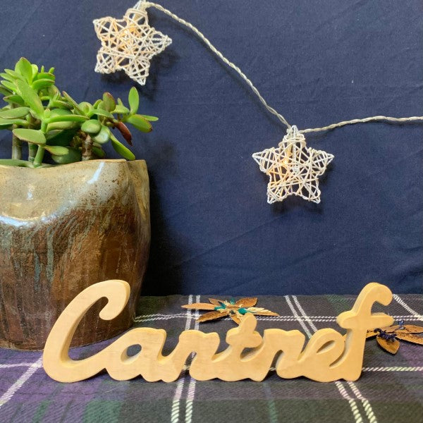 Cartref - Gair mewn Pren